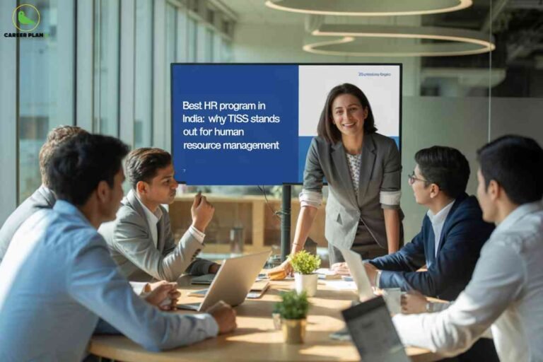 Modern conference room with glass walls and professional team meeting around wooden table featuring smiling female presenter in gray suit jacket and large display screen showing "Best HR program in India: why TISS stands out for human resource management" with Career Plan B logo representing premier HR management education.