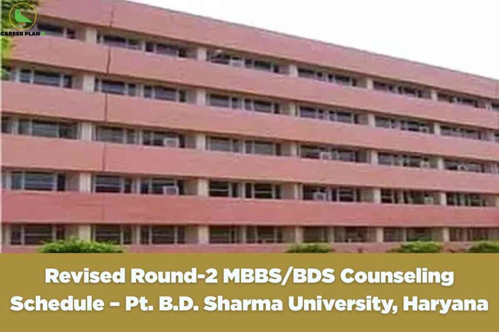 The image shows a large, multi-story institutional building with a simple rectangular design, likely part of Pt. B.D. Sharma University in Haryana. The building is characterized by its light reddish or pink exterior walls and long rows of windows that span horizontally across each floor. Some windows have air conditioning units installed. The foreground includes a few green bushes and plants, adding a touch of nature to the campus setting. In the top left corner is a green bird logo with the text "CAREER PLAN B." The bottom section of the image contains a wide ochre-colored banner, overlaid with bold white text that reads: "Revised Round-2 MBBS/BDS Counseling Schedule – Pt. B.D. Sharma University, Haryana." The overall layout and text emphasize the announcement of a revised counseling schedule for medical and dental admissions.