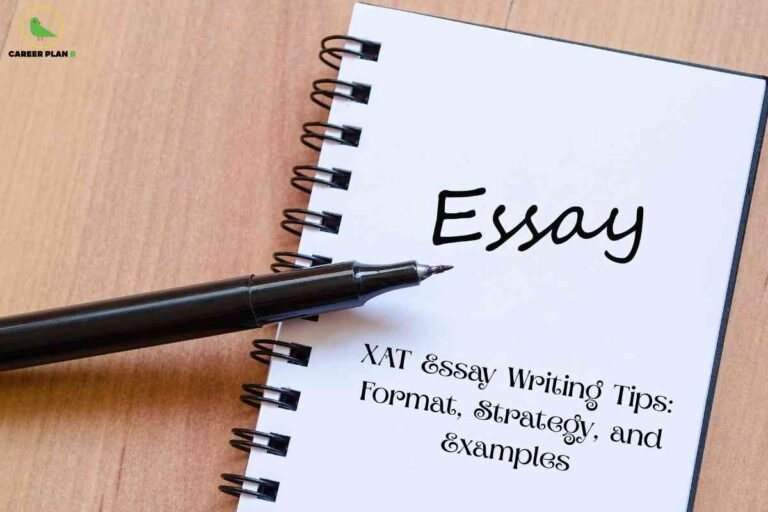 A photo showing a close-up of a spiral-bound notebook placed on a wooden desk, with the page open. On the notebook's page, the word "Essay" is handwritten in large, neat black lettering at the top right. Below this, printed in a decorative font, is the text: "XAT Essay Writing Tips: Format, Strategy, and Examples." A black marker pen lies diagonally across the notebook, with the pen tip positioned near the word "Essay." In the top left corner of the image, the Career Plan B logo with a green bird is visible. The visual emphasizes essay writing guidance for XAT aspirants, focusing on structure, approach, and illustration.