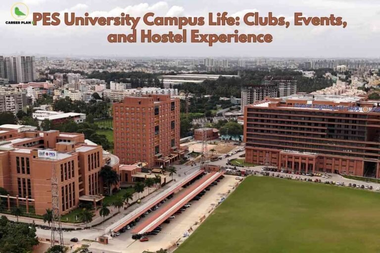 PES University campus life banner image showing an aerial view of the PES University campus with large red‑brick academic blocks, central ground and surrounding Bengaluru cityscape, headline text about PES University campus life with clubs, events and hostel experience, and a green Career Plan B logo in the top‑left corner.