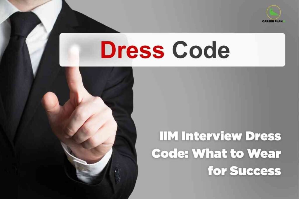 On a grey background, a person in a black business suit points forward and appears to press a glowing white button labeled “Dress Code” in bold red and black text, symbolizing formal guidelines. In the bottom right corner, white bold text reads “IIM Interview Dress Code: What to Wear for Success,” with the Career Plan B logo in the top-right corner.